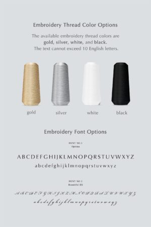 Options for custom embroidery on MANITO silk eye masks showcasing thread colors in gold, silver, white, and black, along with two font styles.