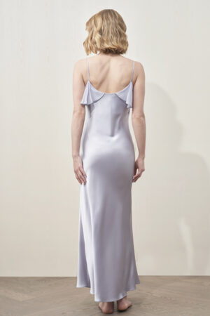 Back full-body view of MANITO Aurora Silk Nightdress in lavender, emphasizing flattering cut and smooth silhouette.