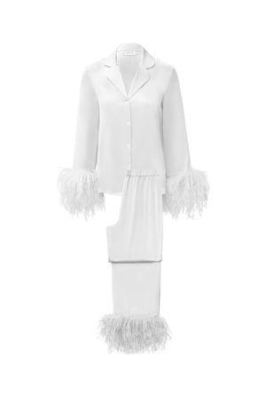 Flat lay of White New Diva Feather Pajamas Set, classic pajama shirt and easy trousers finished with airy feather details.