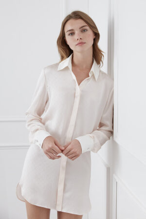 Model in a sophisticated Monogram Silk Long Shirt in white featuring a subtle quilted pattern.